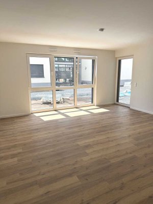 Neubau! Lichtdurchflutete 3-Zimmer Eigentumswohnung mit Sonnenterrasse & Garten