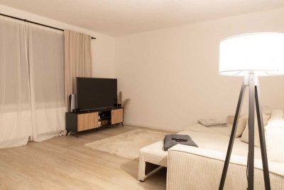 Moderne 2-Zimmer-Wohnung mit Garten, Einbauküche sowie Garage inkl. direktem Zugang zur Wohnung