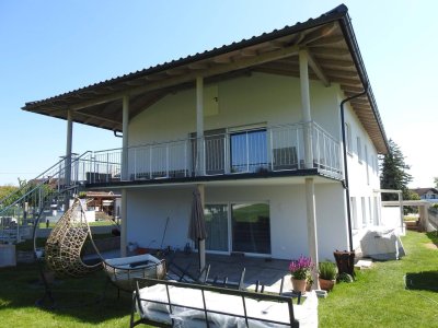 Wohnen und Arbeiten unter einem Dach - exklusiver Neubau-Wohntraum mit Garten