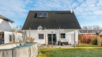 Modernes Familienglück in ruhiger, wassernaher Lage mit Garten und Südwest-Terrasse