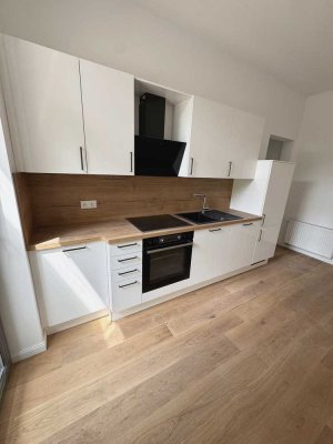 Denkmal- Effizienzhaus - kernsanierte Wohnungen mit EBK im Herzen Lindens!