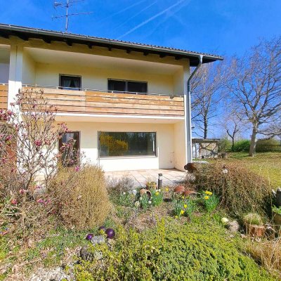 Doppelhaushälfte auf großem Gartengrundstück in Hohenbrunn bei München mit Sanierungsbedarf