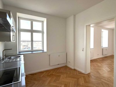 Wohnen im Denkmal im ehemaligen Fliegerhorst mit Wohnküche, Parkett, Einbauküche.