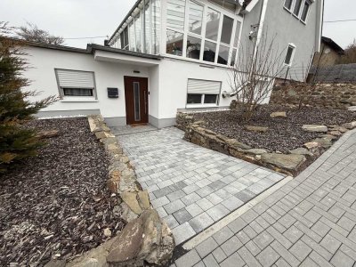 Mietwohnung in Bad Camberg-Dombach, EG mit Garage, Terrasse und Garten.