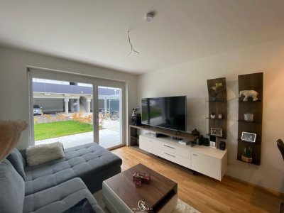 Schöne 3-Zimmer-Gartenwohnung im Neubau mit zwei Carportstellplätze