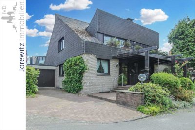 Einfamilienhaus mit Einliegerwohnung in Steinhagen – Wohnen nahe dem Naturschutzgebiet