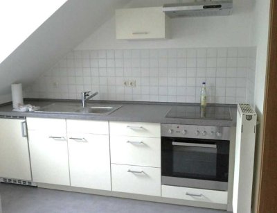 Zentrumsnahe Dachgeschosswohnung mit Stellplatz und Gartennutzung