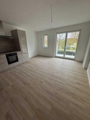 Erstbezug 2OG 3-Zimmer-Wohnung mit zwei Balkonen, Einbauküche und TG-Stellplatz – mitten in Wertheim