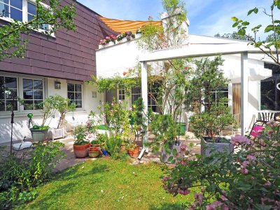 Charmantes Einfamilienhaus mit romantischem Garten in bester Wohnlage
