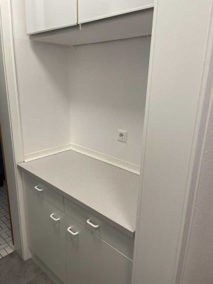 1-Zimmer-Appartement mit kleiner Küche und Bad