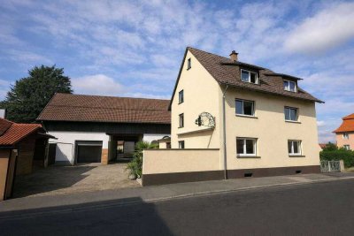 Mehrfamilienhaus mit Scheune und großem Grundstück in Heidelberg-Kirchheim