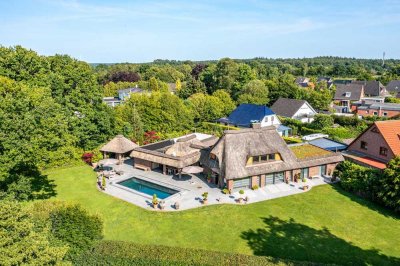 Reetgedecktes Juwel bei Kiel: Exklusivität trifft Naturidylle
mit Seeblick und Infinity Pool