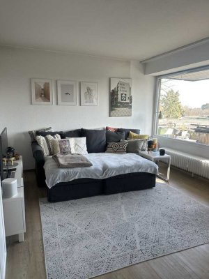 Helle 2-Zimmer-Wohnung mit Südbalkon und saniertem Duschbad im Herzen von Meerbusch-Büderich
