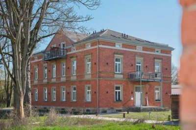 Elegante 3,5-Zimmer Wohnung in einer Villa im Park