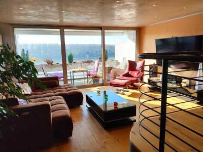 Traumlage am Rhein: Maisonettewohnung mit hochwertiger Einbauküche in Ensen