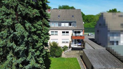 Vermietetes Sechsfamilienhaus mit großem Gemeinschaftsgarten in Sonnenlage und drei Garagen!