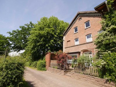 Geräumige 4 Zimmer-Wohnung mit Terrasse und Garten