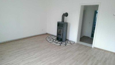 3 Zimmer mit Kamin und Gartennutzung im 4 Familienhaus