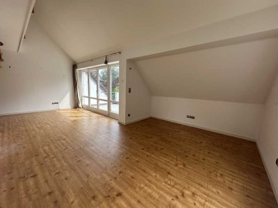 Helle und charmante Maisonette-Wohnung in traumhaft grüner Lage Grünwald