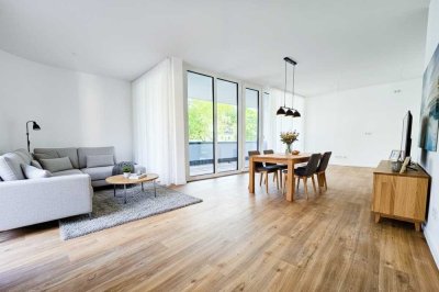 ERSTBEZUG: 3-Zimmer-Neubauwohnung mit neuer Einbauküche, Südbalkon und Tiefgaragenstellplatz