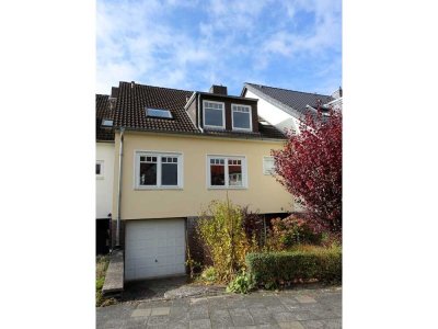 Familienfreundliches Reihenmittelhaus mit Garten und Garage in gepflegtem Umfeld