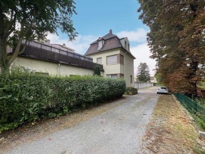 Friesenheim! 
Einfamilienhaus mit Anbau, Baulücke und 19 Garagen!