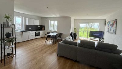 Wohnung im 1. Stock mit Balkon und eigenem Gartenanteil
