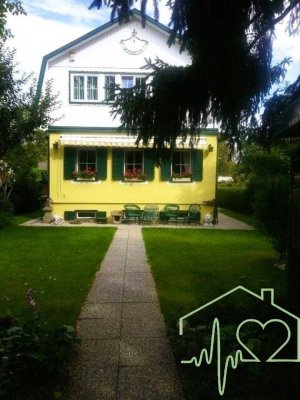 Modernes Wohnen in grüner Oase - Traumhaus in Wien 1220 mit großem Garten, Garage auf Eigengrund!