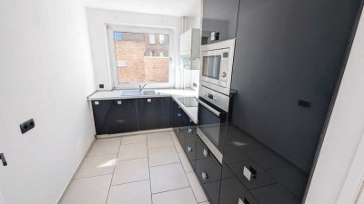 Renovierte 3 Zimmerwohnung mit Balkon, Stellplatz, Einbauküche & Fahrstuhl im Östlichen Ring