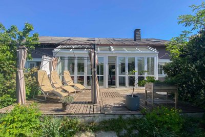 Haus mit wunderschönem Wintergarten und Grundstück in Parndorf!