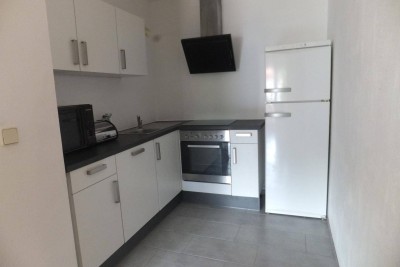 Südausgerichtete 2-Zimmer Erdgeschosswohnung mit Balkon und Garage