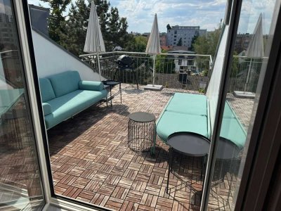 Traumhafte 3-Zimmer Wohnung mit Dachterrasse und Einzelgarage in zentraler Lage