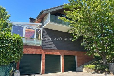 Viel Raum für Familie & Fahrzeuge – Haus mit PV-Anlage und 4 Garagen in Mettmann