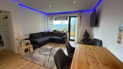 Renovierte EG-Wohnung mit Garten und Süd-Balkon in ruhiger Lage.