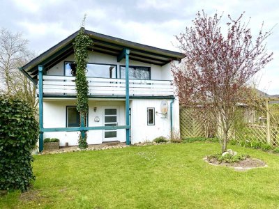 Zentral gelegene Dachgeschosswohnung mit großem Balkon und eigenem Garten
