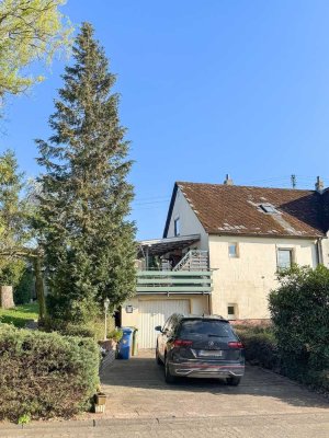 Handwerkerhaus - Doppelhaushälfte auf schönem Grundstück! Sanierungsbedürftig.