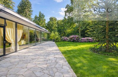 ELEGANTES EINFAMILIENHAUS MIT GROßEM GARTEN, 
SPA-BEREICH SOWIE INNEN- UND AUßENPOOL