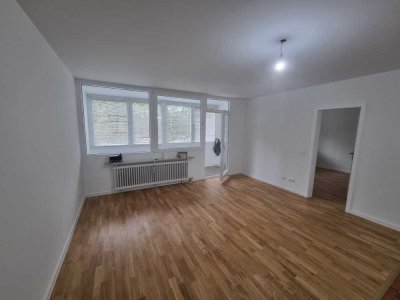 Top-sanierte 3-Zimmer-Eigentumswohnung mit verglastem Balkon und Tiefgaragenstellplatz