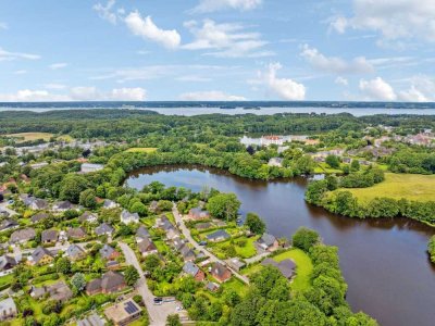 Modernisiertes Einfamilienhaus mit herrlichem Garten und Baulücke in begehrter Lage am Mühlenteich