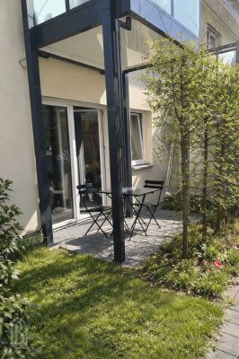 Exklusive 1-Zimmer-Wohnung mit Einbauküche & Gartenzugang in grüner Umgebung