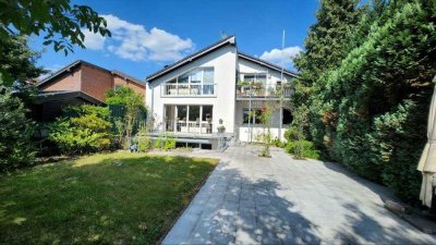 Großzügige Wohnung im Zweifamilienhaus mit 5 Schlafzimmern in idyllischer Lage