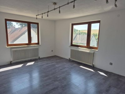 Wohnung mit Garten und Garage