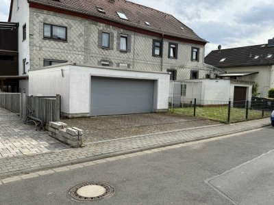 Top Kapitalanlage: MFH mit 7 Wohnungen, Doppelgarage und Pkw-Stellplätzen