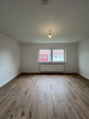 Beste Anbindung trifft ruhiges Wohnen - 3 Zimmer mit EBK & Option auf Mietergarten