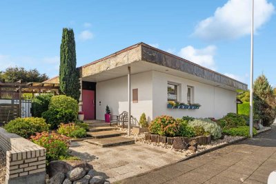 Ein Zuhause mit Perspektive - freistehender Bungalow mit Traumgrundstück in Dormagen-Hackenbroich