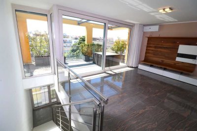 Urbaner Lifestyle & Naturidyll in bester Harmonie – Exklusive Penthouse-Maisonette im grünen Quadrat