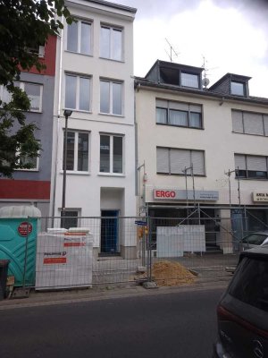Neubauwohnung im Zweifamilienhaus in zentraler Lage