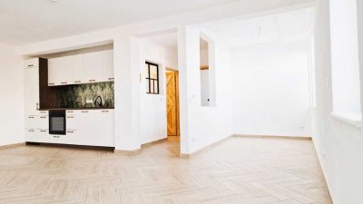 EG Wohnung mit Terrasse | NACHHALTIGSTE Immobilie Wolfsburgs, Lehmbau, PV - Autarkie, Appsteuerung