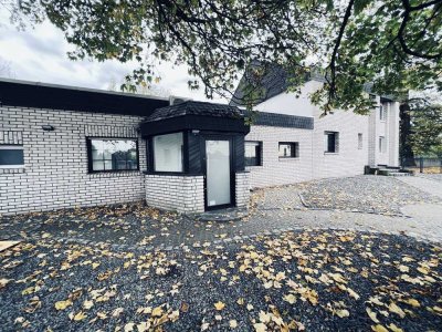 Luxuriöse Bungalow-Wohnung mit großem Wintergarten, schönem Garten & Klimaanlage in ländlicher Lage