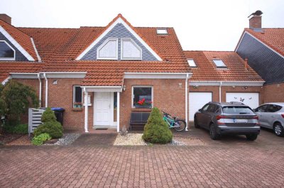 Gepflegtes Reihenhaus mit Garage auf sonnigem Gartengrundstück